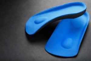 Custom Orthotics. Image of Custom Orthotics insoles.
