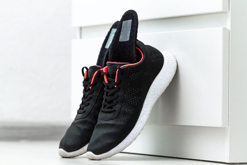 Step Into Comfort: Your Guide to Finding Orthopedic Shoes in Ottawa? Orthopedic insoles for sports shoes. Treatment and prevention of flatfeet and orthopedic foot diseases. Foot care, foot comfort. Health care, wearing comfortable shoes.