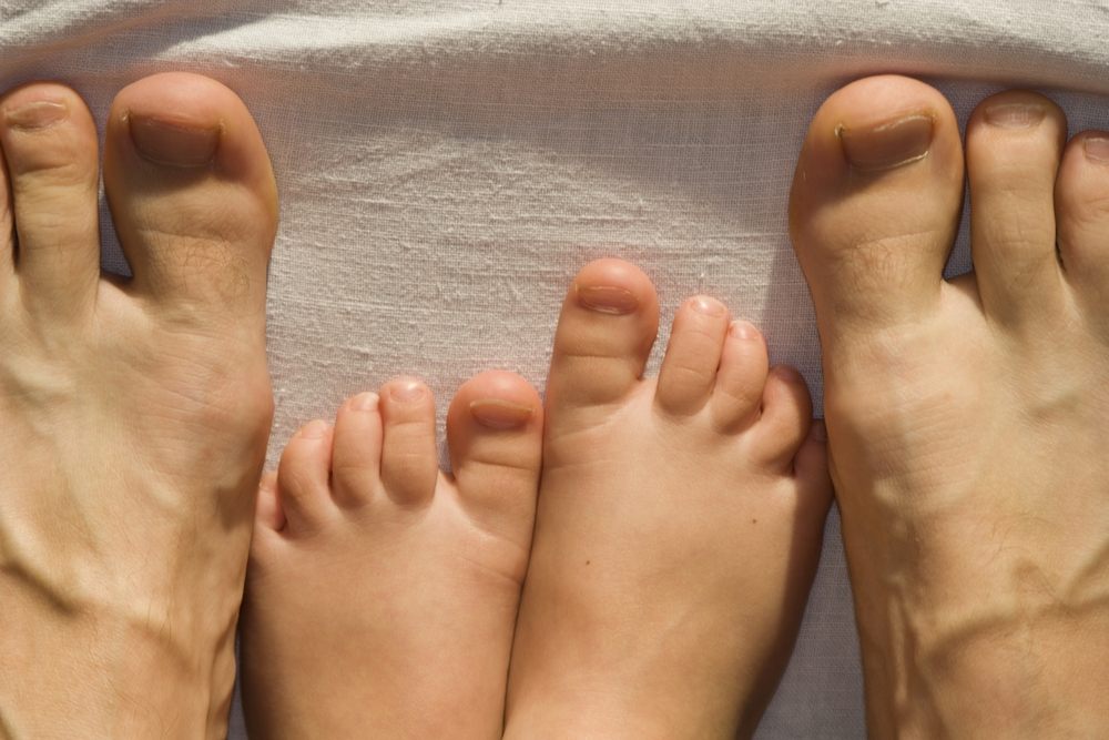 How Nutrition Impacts Foot Health: Insights from an Ottawa Nutritionist. dad and child foots.